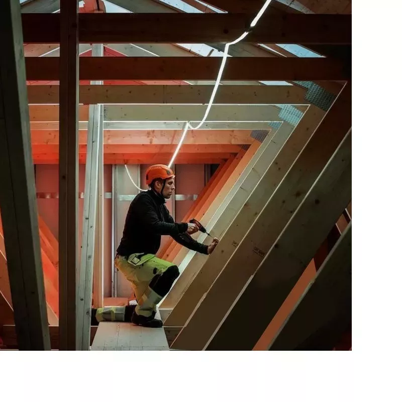 Construction site lighting using LED strip installed by a craftsman